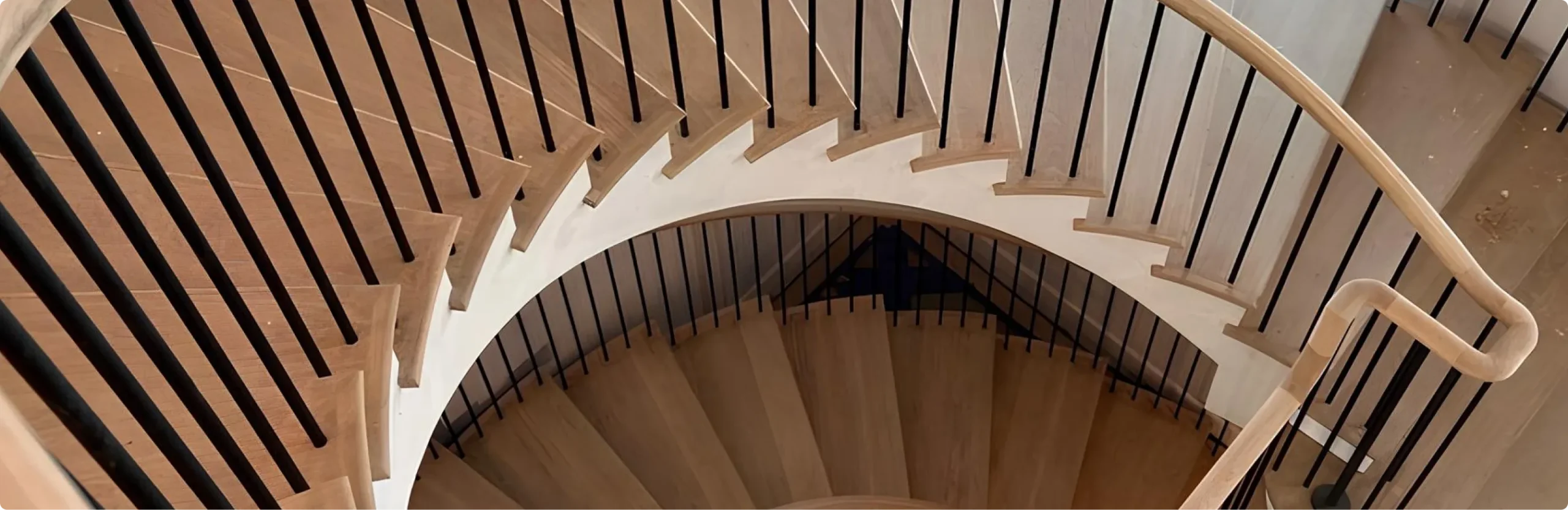 <p>Custom <em>Stairs & Railings</em> — Built to <br />Spec. <em>On Schedule</em>. Code—Compliant.</p>
