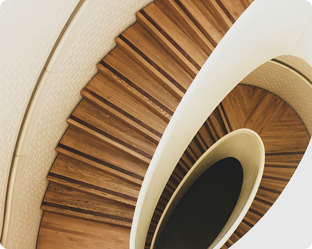 Nothing kills “premium” faster than a stair that moves under foot.